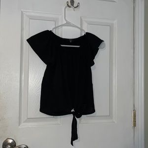 Size small, black shirt from Iris